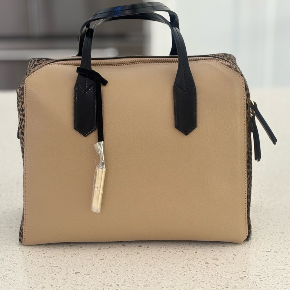 Innue bag made in Italy. Black and beige leather and animal hair. Never used.